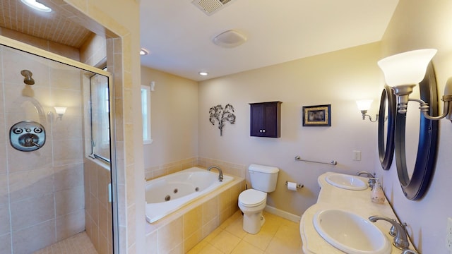 full bathroom with tile patterned floors, separate shower and tub, toilet, and sink