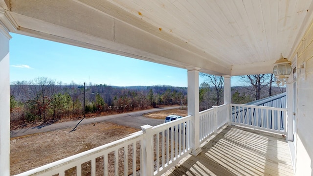 wooden deck featuring a porch