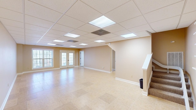 interior space featuring a paneled ceiling