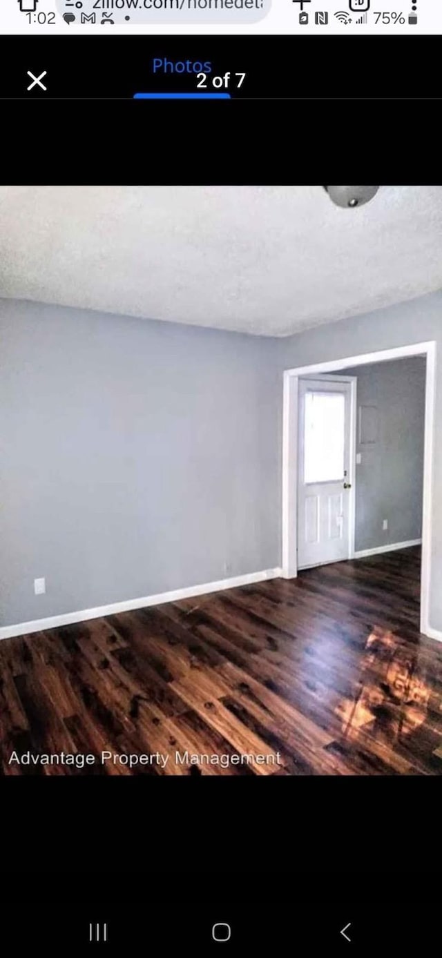 entryway featuring dark wood-type flooring