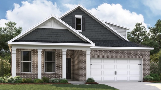 view of front of home featuring a garage, driveway, and brick siding