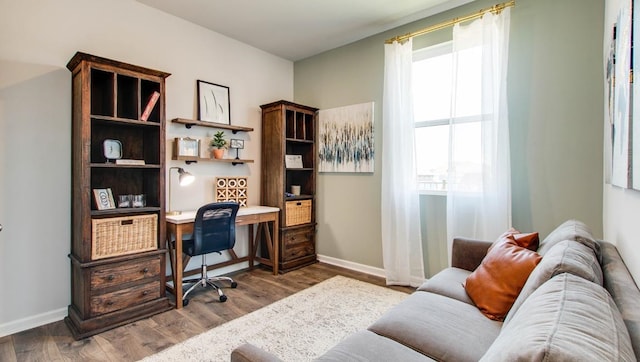 office area with dark hardwood / wood-style flooring