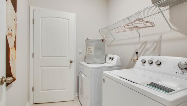 laundry area with washing machine and dryer