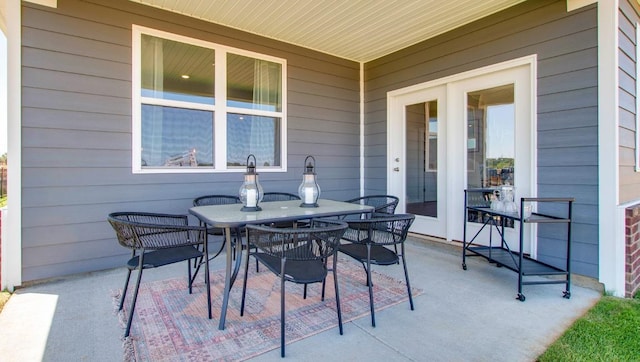 view of patio with outdoor dining area