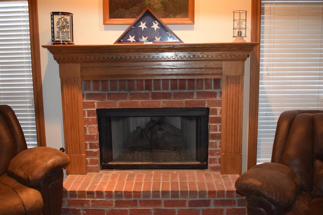 details featuring a brick fireplace