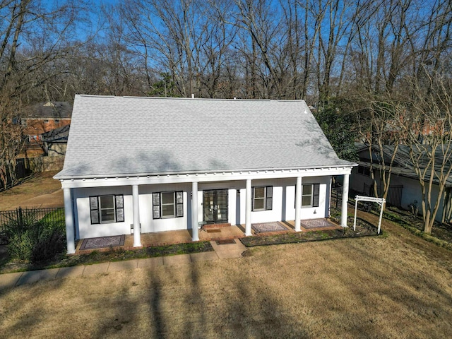 view of front of house featuring a front yard and a porch