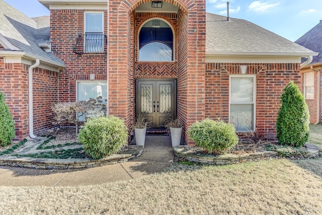 doorway to property featuring french doors