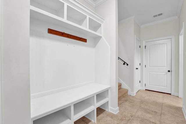 mudroom featuring ornamental molding