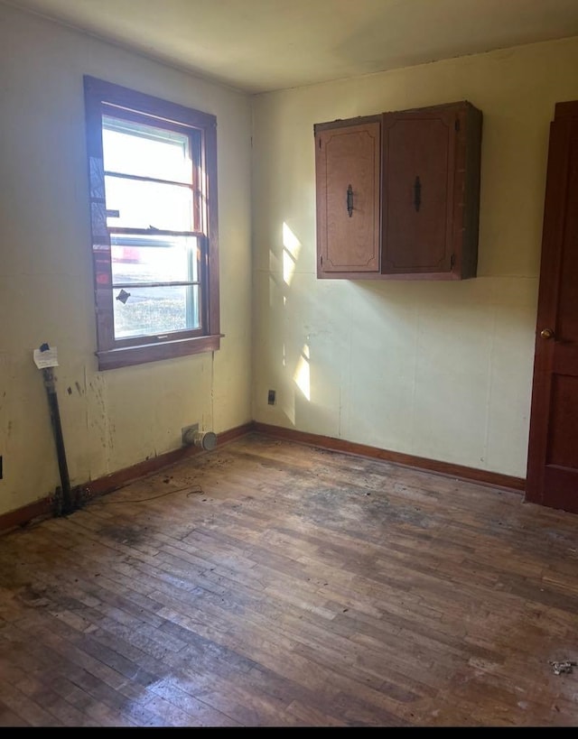 empty room featuring dark hardwood / wood-style floors