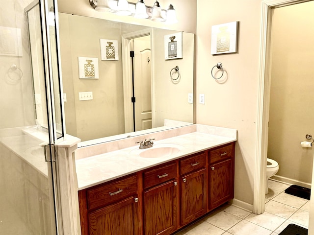 bathroom with walk in shower, tile patterned flooring, vanity, and toilet