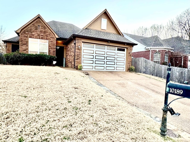 view of front of property with a garage