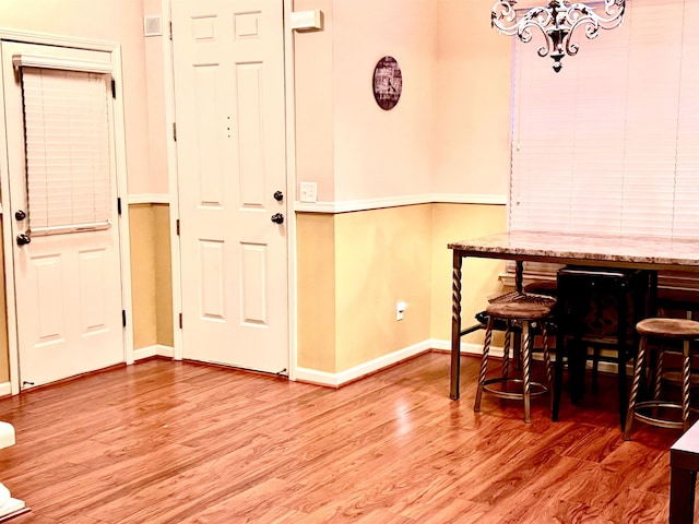 dining room with hardwood / wood-style floors