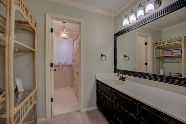 bathroom with a chandelier, vanity, and ornamental molding