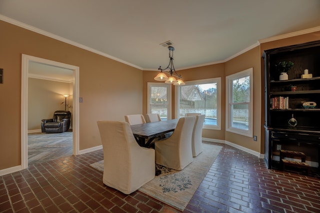 dining room with ornamental molding