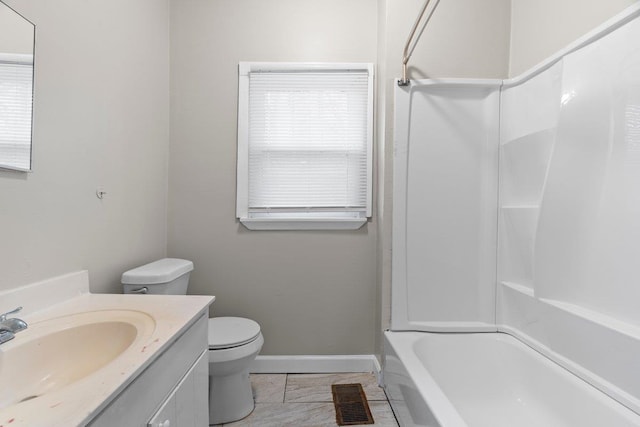 full bathroom with tile patterned floors, shower / bathing tub combination, vanity, and toilet