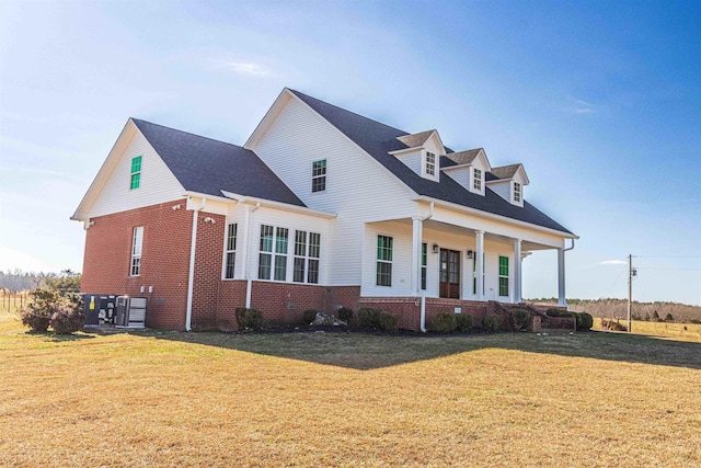 cape cod-style house with a porch, central AC, and a front lawn