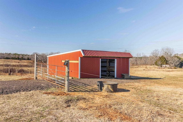 view of outbuilding featuring a rural view