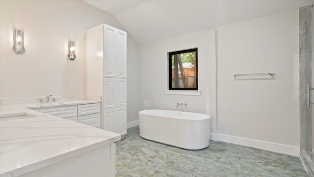 bathroom featuring plus walk in shower, vanity, and lofted ceiling