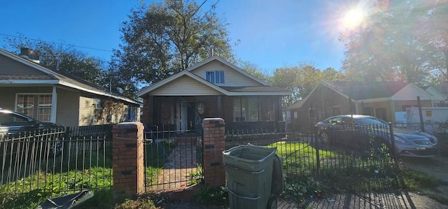 bungalow featuring a sunroom