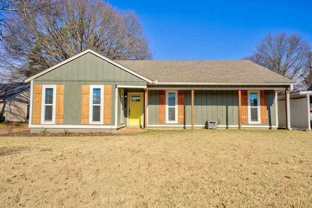 ranch-style home with a front lawn