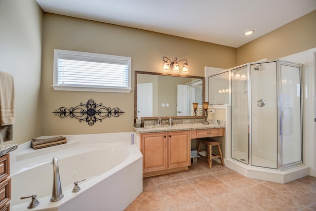 bathroom with tile patterned flooring, vanity, and independent shower and bath