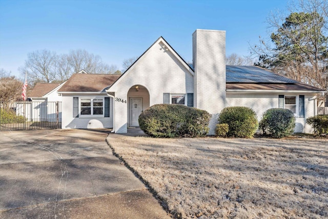 view of front of home with solar panels