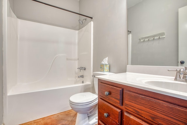 full bathroom featuring toilet, vanity, tile patterned floors, and bathtub / shower combination