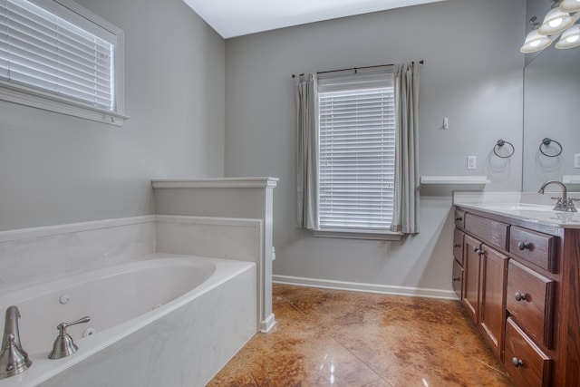 bathroom with vanity, tile patterned floors, and a bathing tub