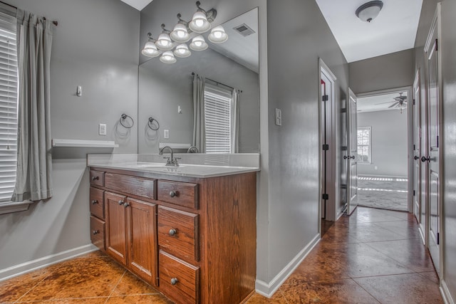 bathroom with vanity and ceiling fan