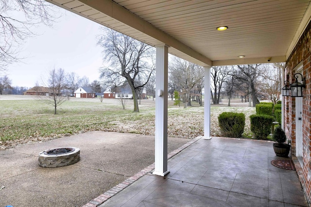 view of patio featuring a fire pit