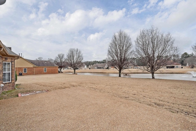 view of yard with a water view