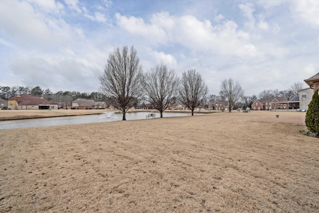 view of yard featuring a water view