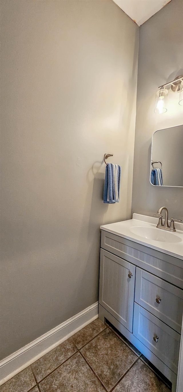 bathroom with tile patterned flooring and vanity