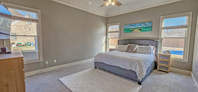 bedroom with light carpet, multiple windows, and ceiling fan