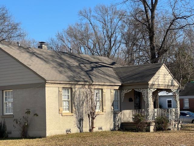 view of home's exterior featuring a porch