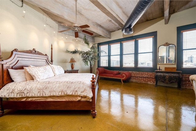 bedroom featuring ceiling fan and concrete floors