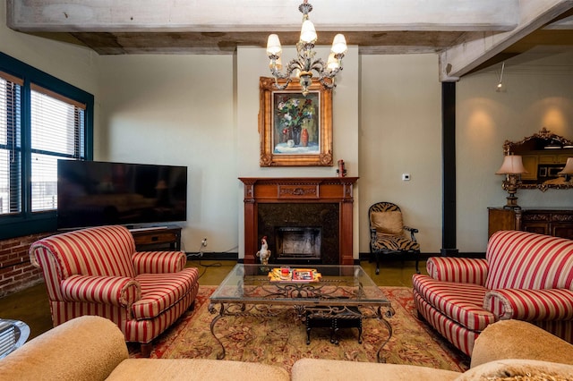 living room with beamed ceiling, a notable chandelier, and a high end fireplace