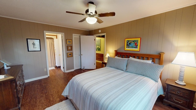 bedroom featuring ceiling fan, crown molding, and dark hardwood / wood-style floors