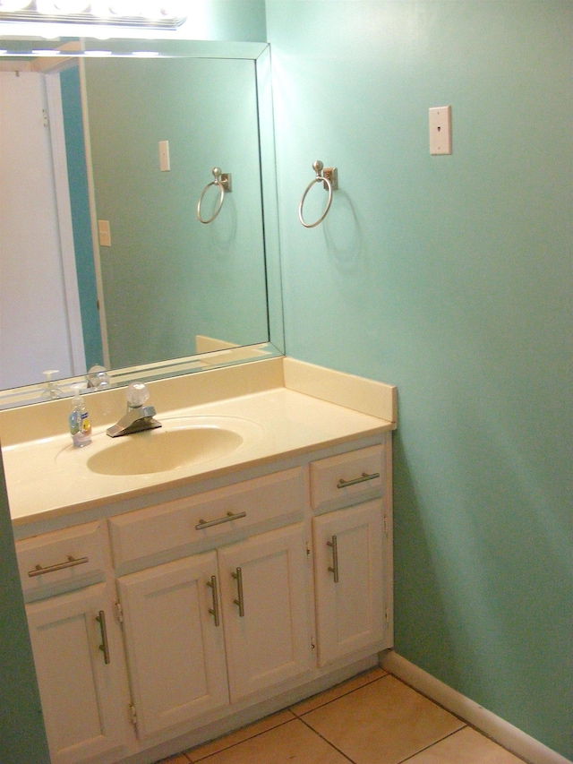 bathroom with vanity and tile patterned floors