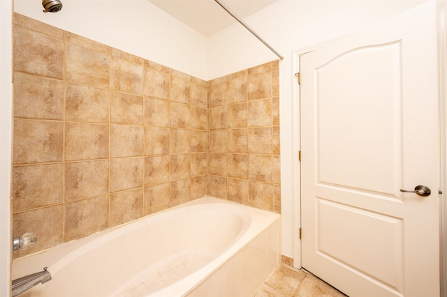 bathroom featuring bathing tub / shower combination and tile patterned floors