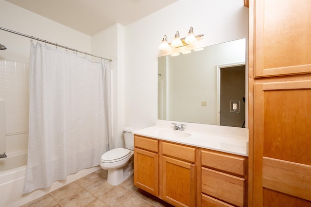 full bathroom featuring tile patterned floors, toilet, vanity, and shower / bath combo