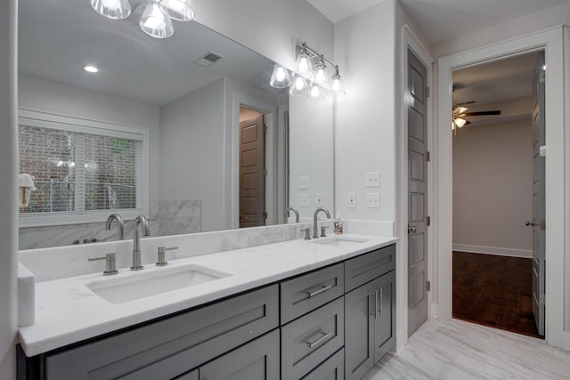 bathroom featuring vanity and ceiling fan