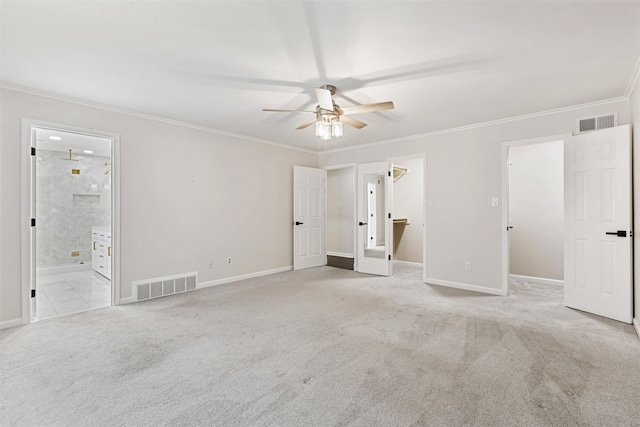 unfurnished room featuring light carpet, ceiling fan, and ornamental molding