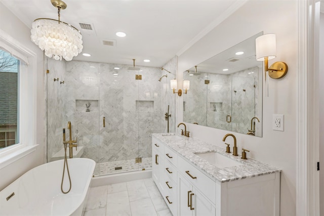 bathroom with vanity, a chandelier, shower with separate bathtub, and ornamental molding