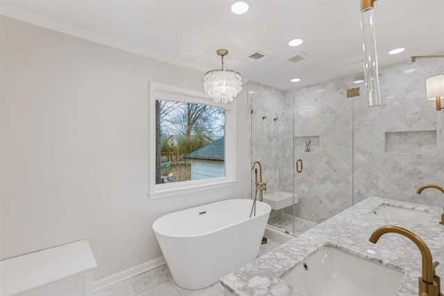 bathroom featuring vanity, ornamental molding, independent shower and bath, and an inviting chandelier