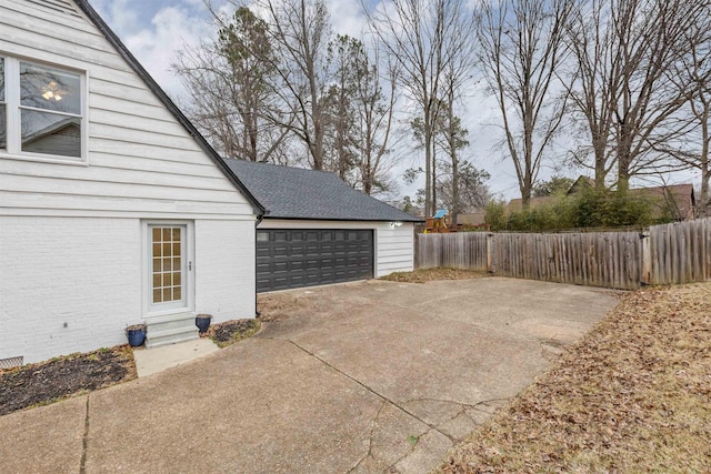 exterior space with a garage