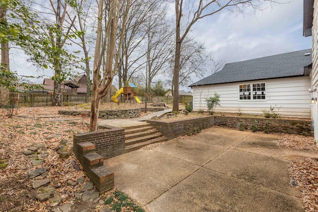 view of patio featuring a playground