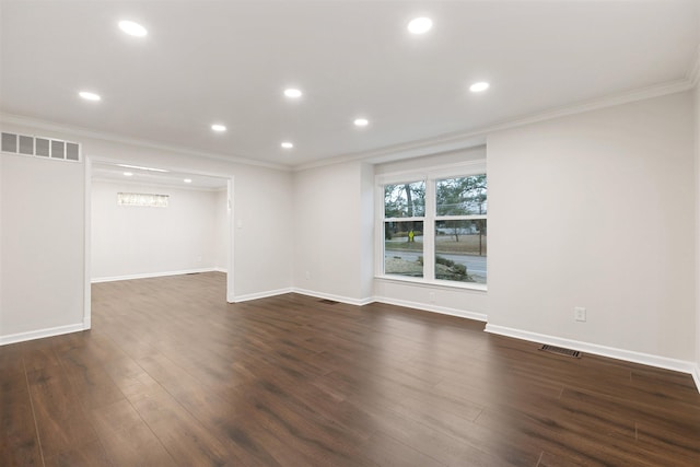 unfurnished room with dark hardwood / wood-style flooring and crown molding