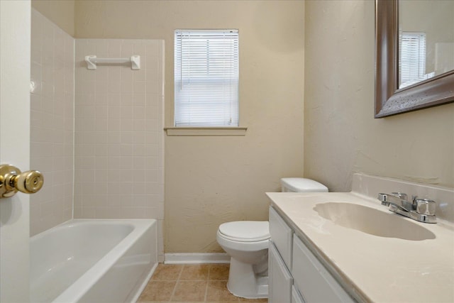 full bathroom with shower / bathing tub combination, tile patterned flooring, vanity, and toilet