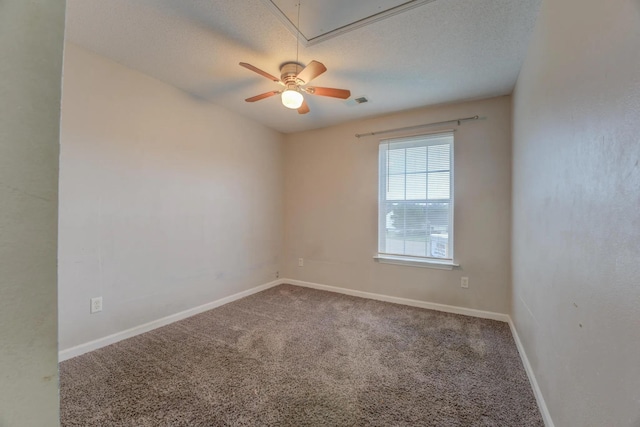 unfurnished room with ceiling fan, carpet floors, and a textured ceiling